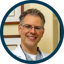 Dr Victor Muradian with a patient